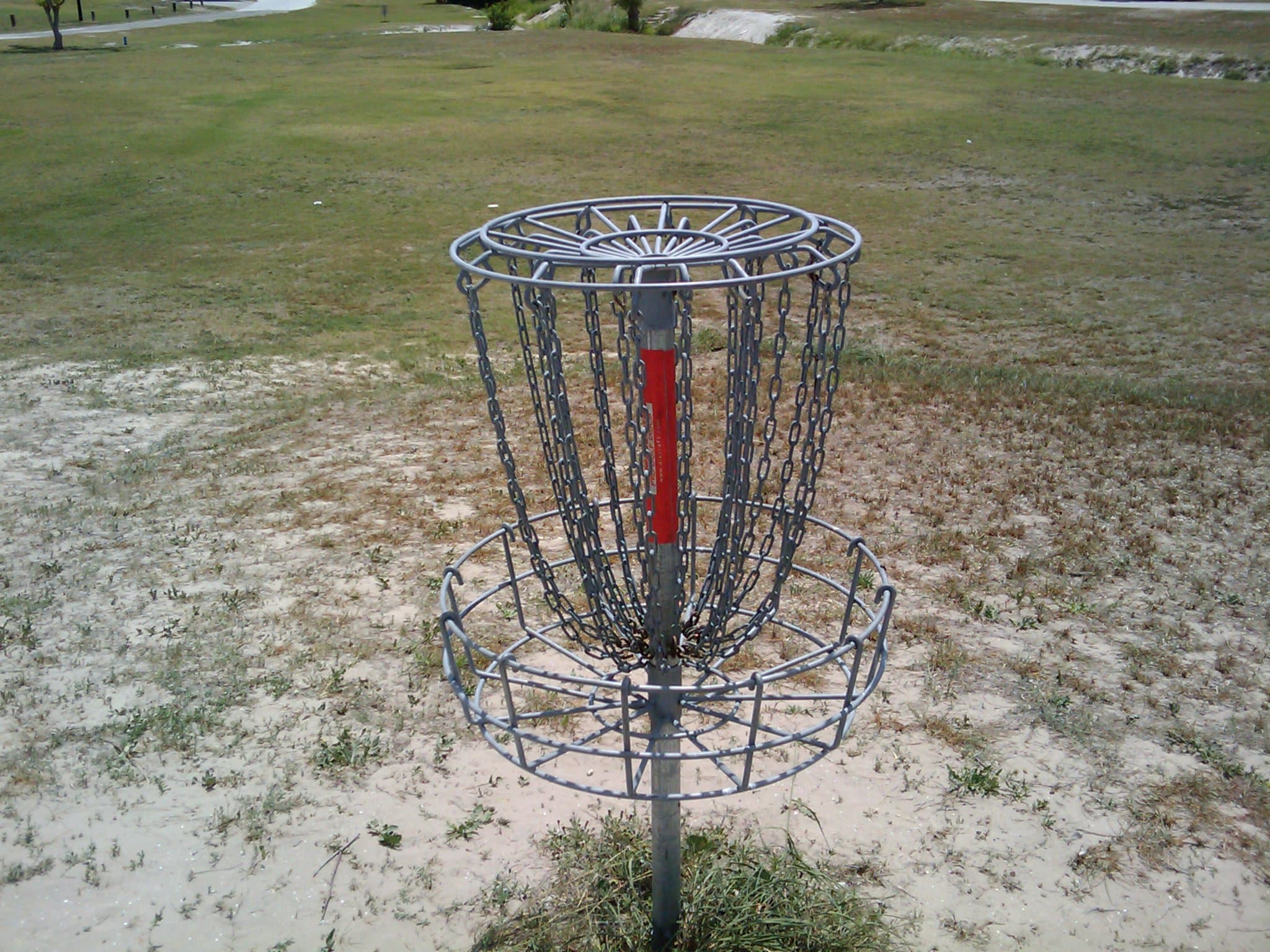 Disc golf basket at West Guth Park in Corpus Christi, Texas